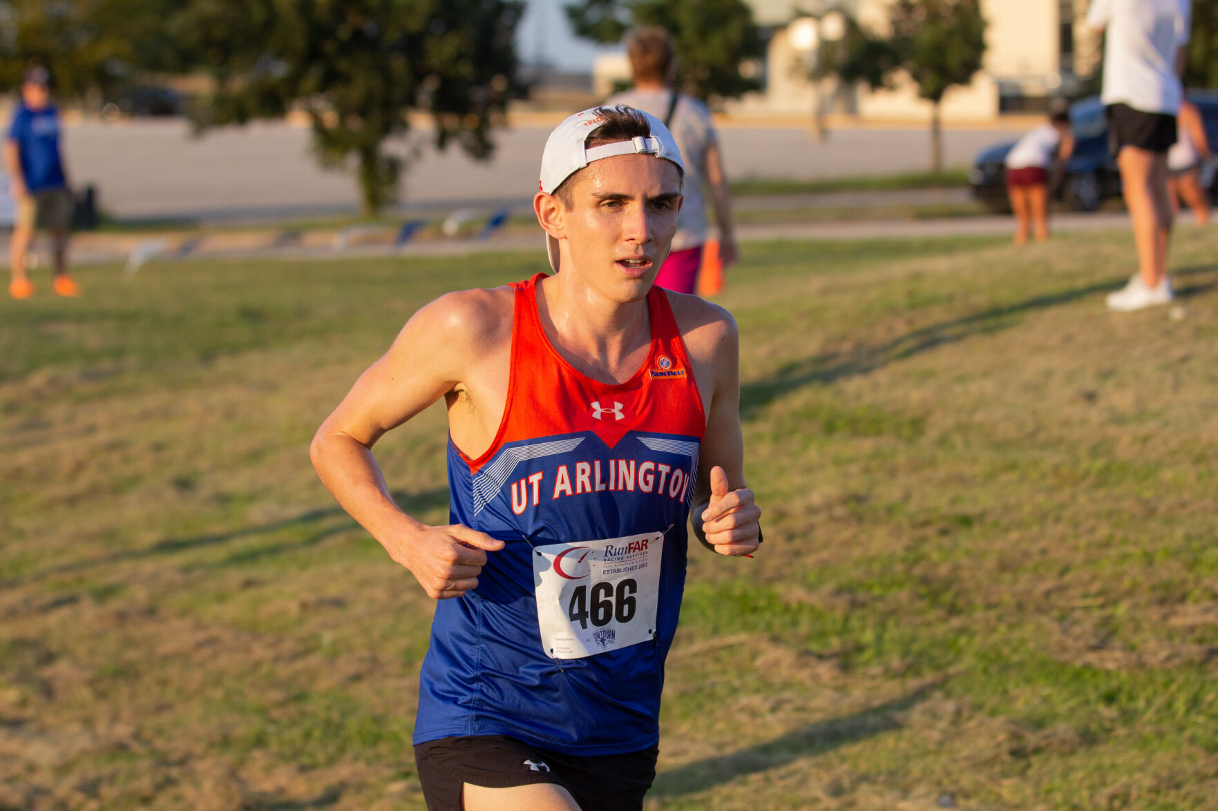 Track and field senior distance runners break personal and meet records at season finale